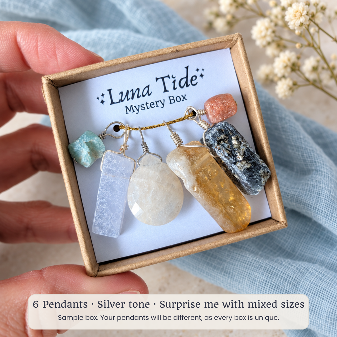 Sample Luna Tide mystery box with 6 silver tone crystal pendants in mixed sizes